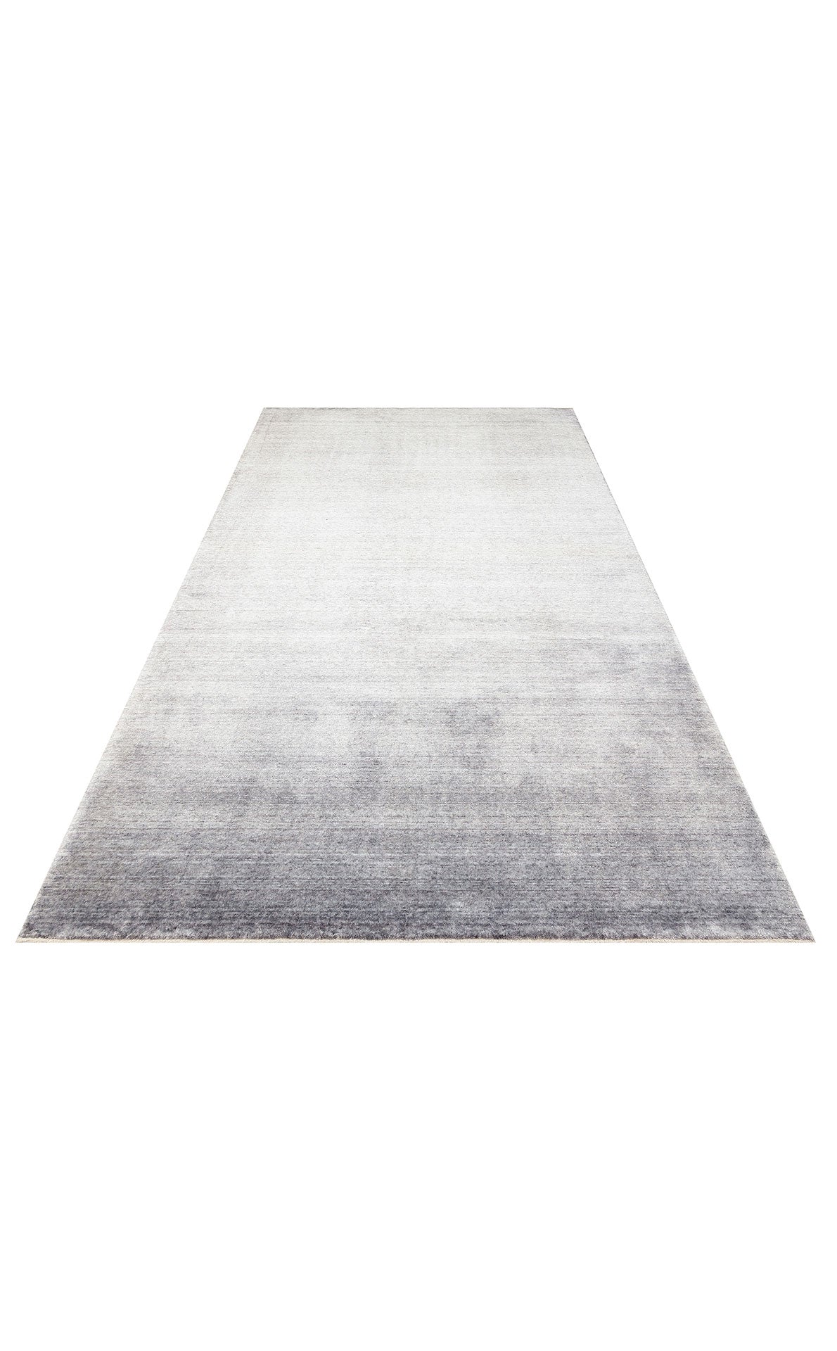 Taftan TF PLAIN D. GREY Halısı, kıvrımlı saçak tasarımıyla Taftan Özel Tezgah Halısı olarak öne çıkıyor.