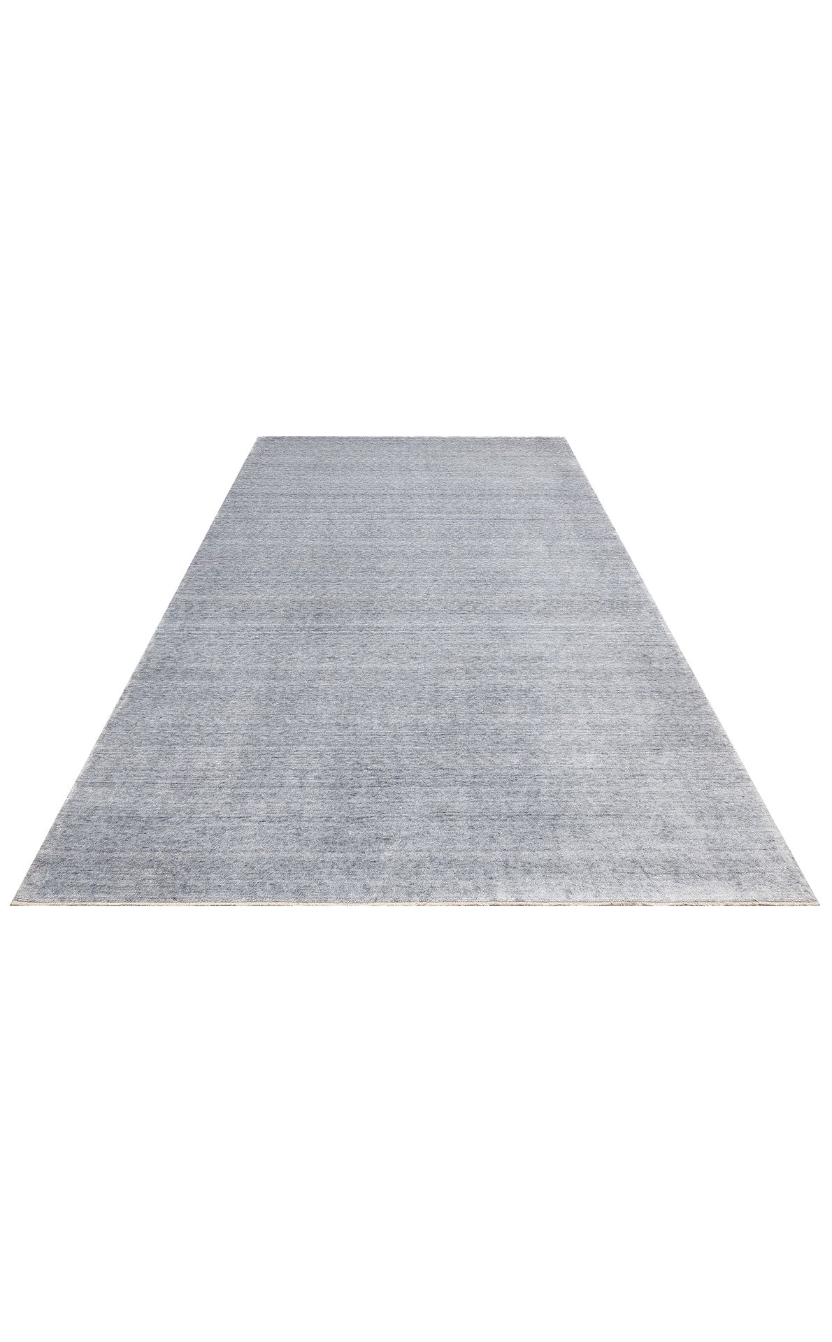 Taftan TF Plain L. Grey, el emeği ile üretilmiş Taftan Özel Tezgah Halısı'nın geniş açıdan görünümü.