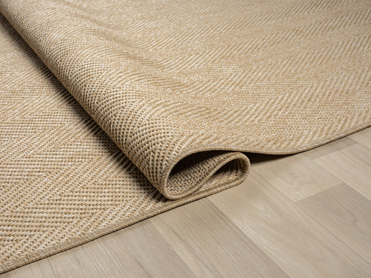 Sisal Halı, Halı Vagonu Himalaya 665 Bej modeli, polipropilen ve polyester malzemeden üretilerek şık bir görünüm sunuyor.