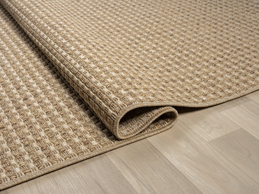 Halı Vagonu Himalaya 667 Kahve Sisal Halı, polipropilen ve polyester malzemeden üretilmiş, şık bir tasarıma sahip.