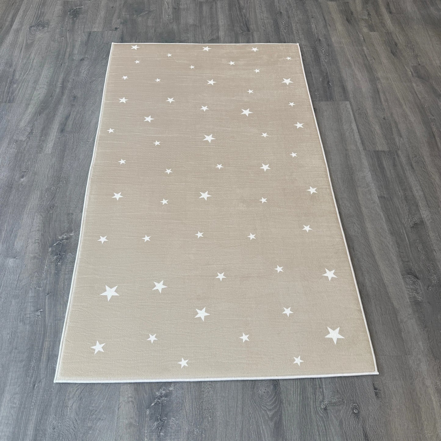 100x175 - 11mm Deri Taban Beyaz Yıldızlı Bej Çocuk Halısı - HALI VAGONU