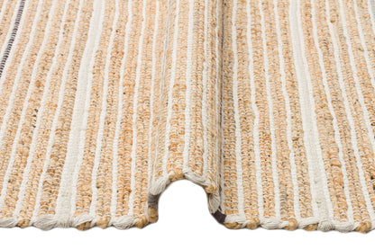 Juno Jüt Ech 05 Doğal Gri Flatweave El Dokuma Naturel Jüt Hasır Halı - Çift taraflı kullanımı ve saçaklı kenar yapısıyla modern bir dekorasyon unsuru.