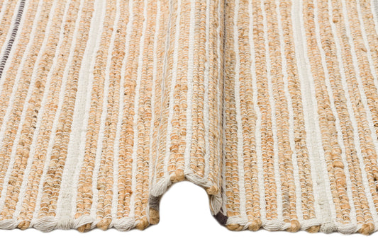Juno Jüt Ech 05 Doğal Gri Flatweave El Dokuma Naturel Jüt Hasır Halı - Çift taraflı kullanımı ve saçaklı kenar yapısıyla modern bir dekorasyon unsuru.