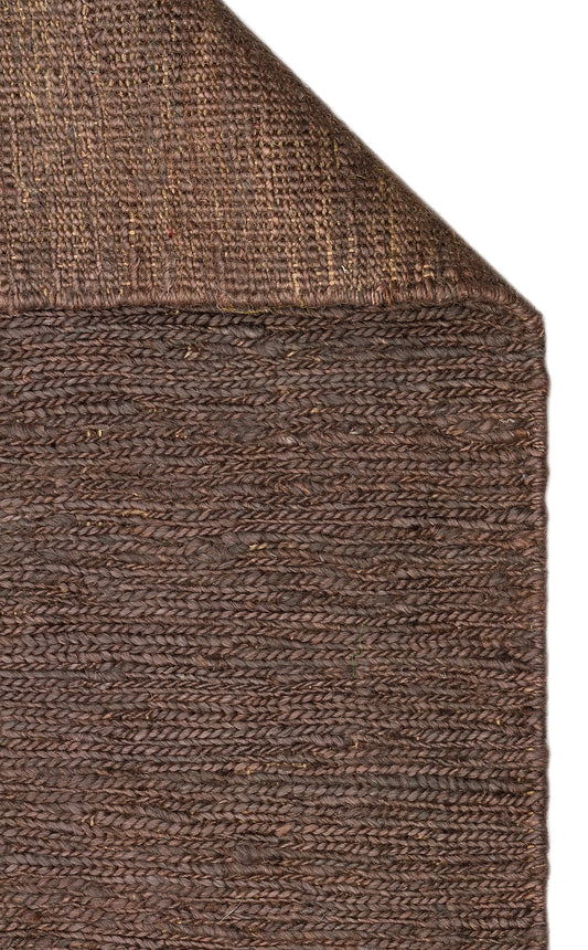 Soumak SMK Plain Brown Örgülü Naturel Kendir Halı, katlama kenar detayıyla birlikte.