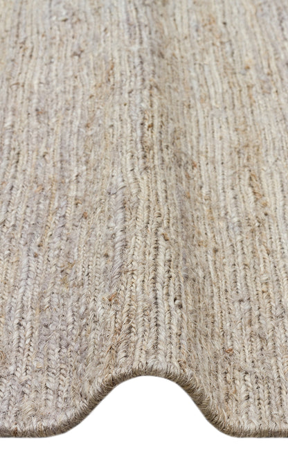 Soumak SMK Plain Grey Örgülü Naturel Kendir Halı iç mekan kullanımı.