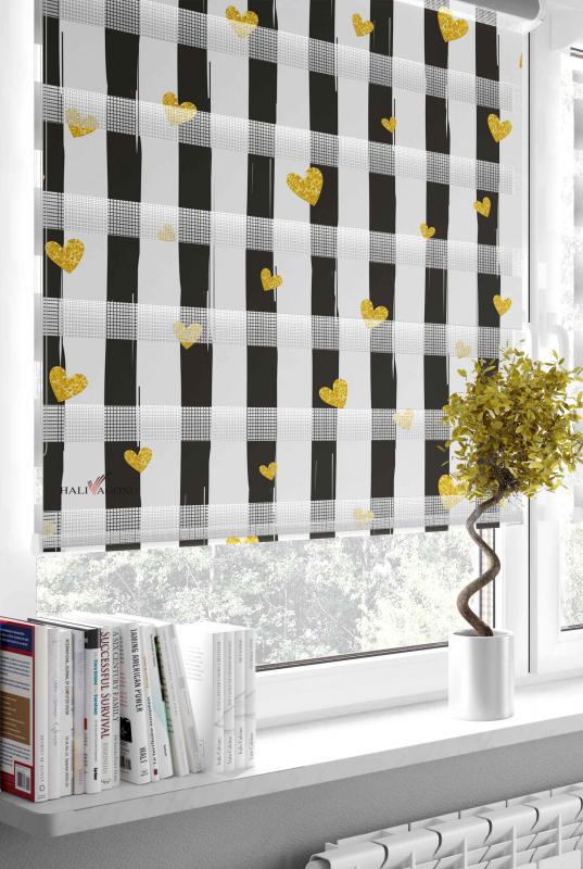 HV350 Siyah Beyaz Kalpli Zebra Perde, modern tasarımı ve işlevselliği ile ev dekorasyonuna şıklık katıyor.